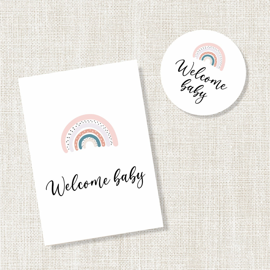 Wit felicitatiekaartje met regenboog en de tekst Welcome baby