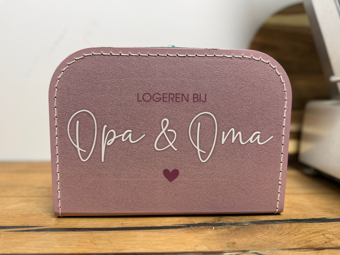 No Waste roze koffertje 25 cm met bestickering aan beide kanten en ernstige schade