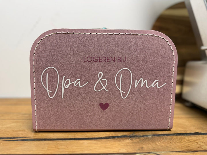 No Waste roze koffertje 25 cm met bestickering aan beide kanten en ernstige schade