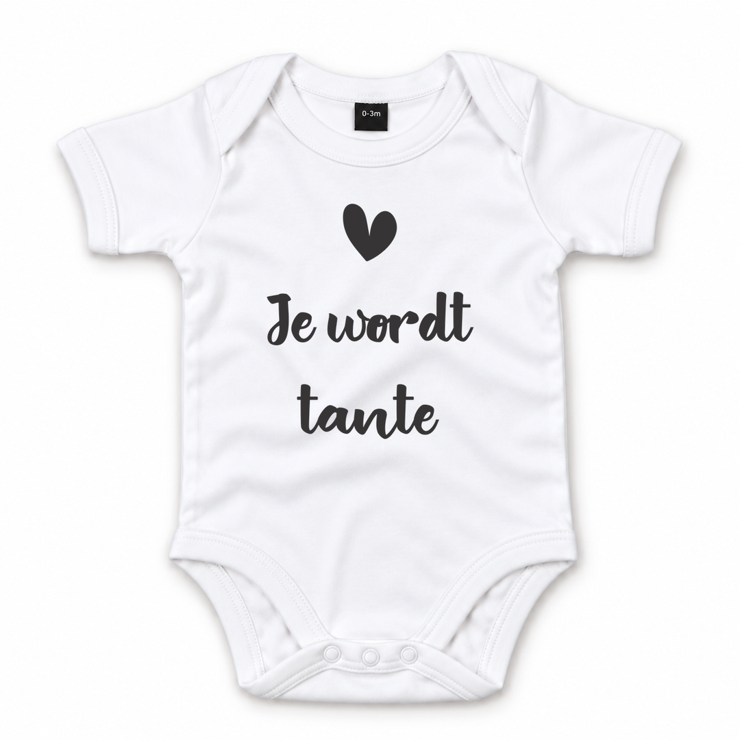Wit babyrompertje met tekst Je wordt tante voor zwangerschapsaankondiging.