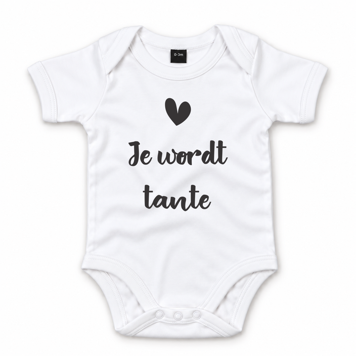 Wit babyrompertje met tekst Je wordt tante voor zwangerschapsaankondiging.