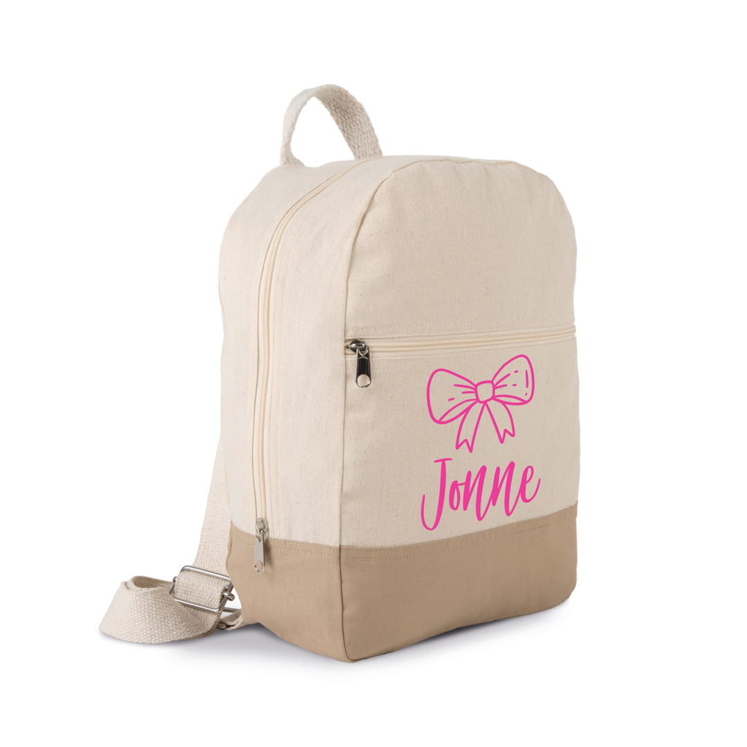 rugzak met naam Jonne met roze strik icoon, gepersonaliseerde katoenen rugtas voor peuters en kleuters in ecru met beige onderkant