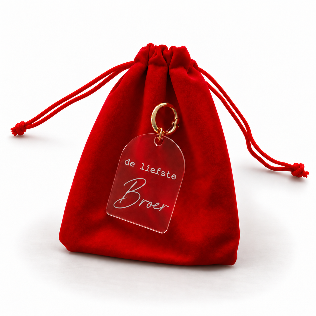 Sleutelhanger de liefste broer met rood cadeauzakje.