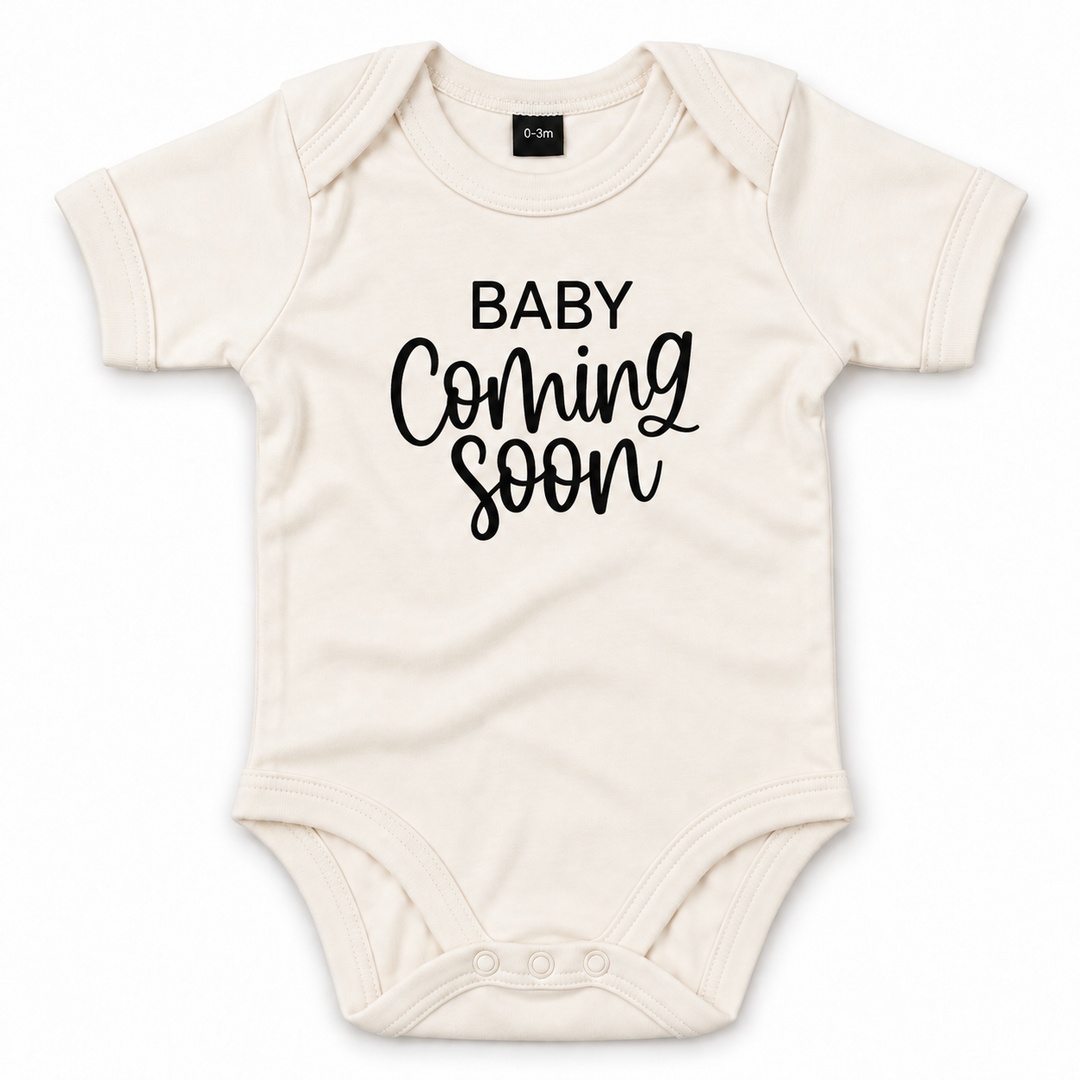 Naturel Baby Coming Soon romper zonder jaartal.