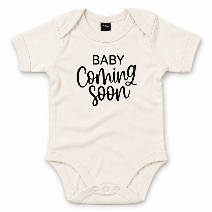 Naturel Baby Coming Soon romper zonder jaartal.